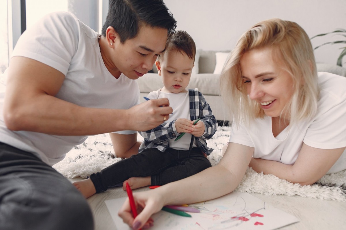 how to discipline a 1 year old - stock image of family