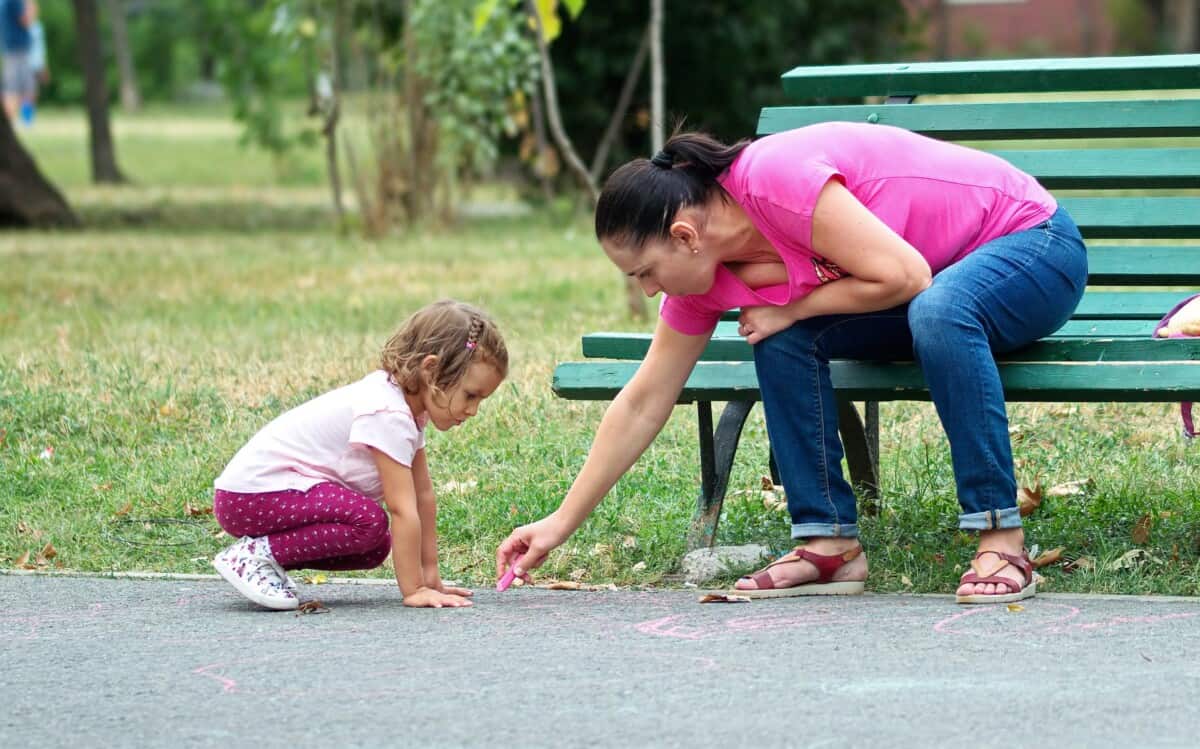 mom and child on park bench for post kids not listening