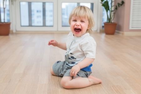 toddler crying or screaming on the floor