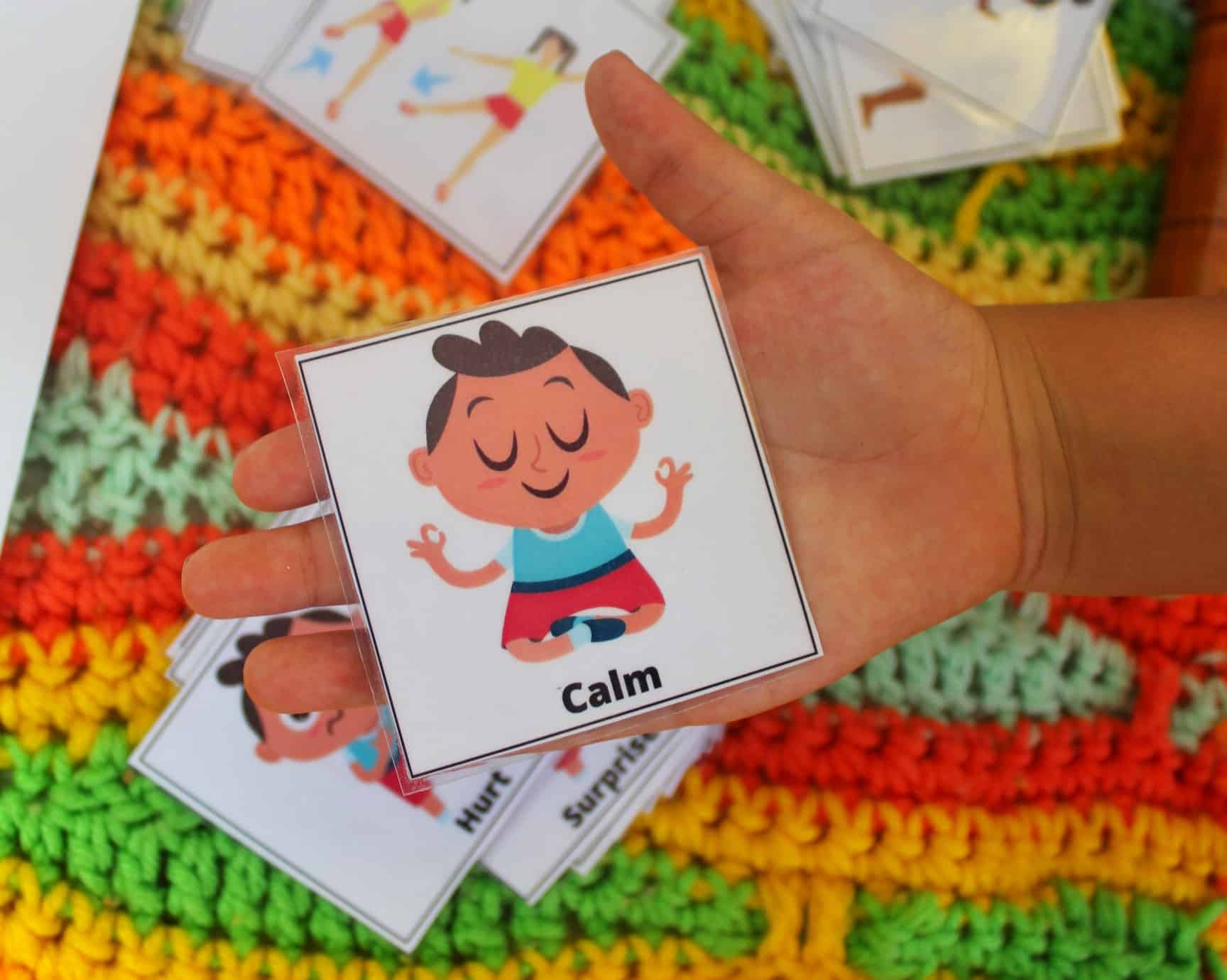 picture of childs hand holding calm card