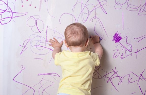 toddler colouring on walls