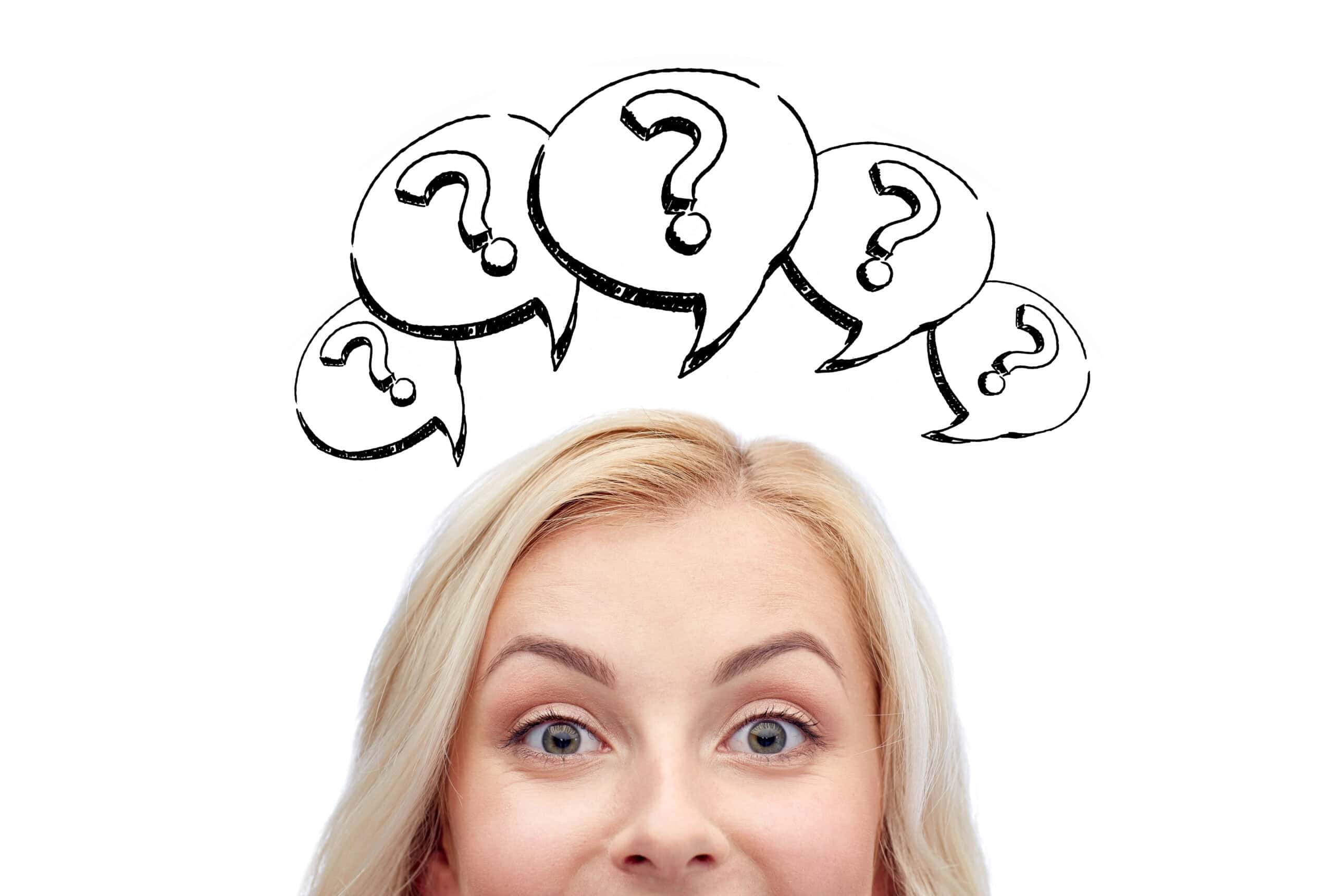 woman's face with question marks above